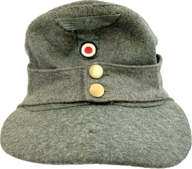 WWII GERMAN MOUNTAIN TROOP FIELD CAP: WWII GERMAN MOUNTAIN TROOP FIELD CAP. WELL WORN CONDITION WITH SOME MOTH NIPS. WEAR INSIDE WITH FULL SWEAT BAND. SIZE 56
