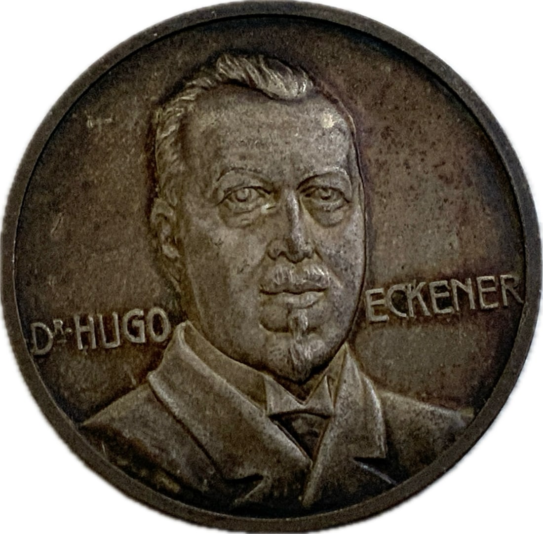 GERMANY SILVER MEDAL LZ126 ZEPPELIN CROSSING TO AMERICA: GERMANY SILVER MEDAL 1924 LZ 126 ZEPPELIN CROSSING TO AMERICA. RARE . 1 1/4 DIAM. 14.82G. BY LAUER , BUST OF DR. HUGO -ECKENER . NICELY TONED. EXTRA FINE CONDITION.