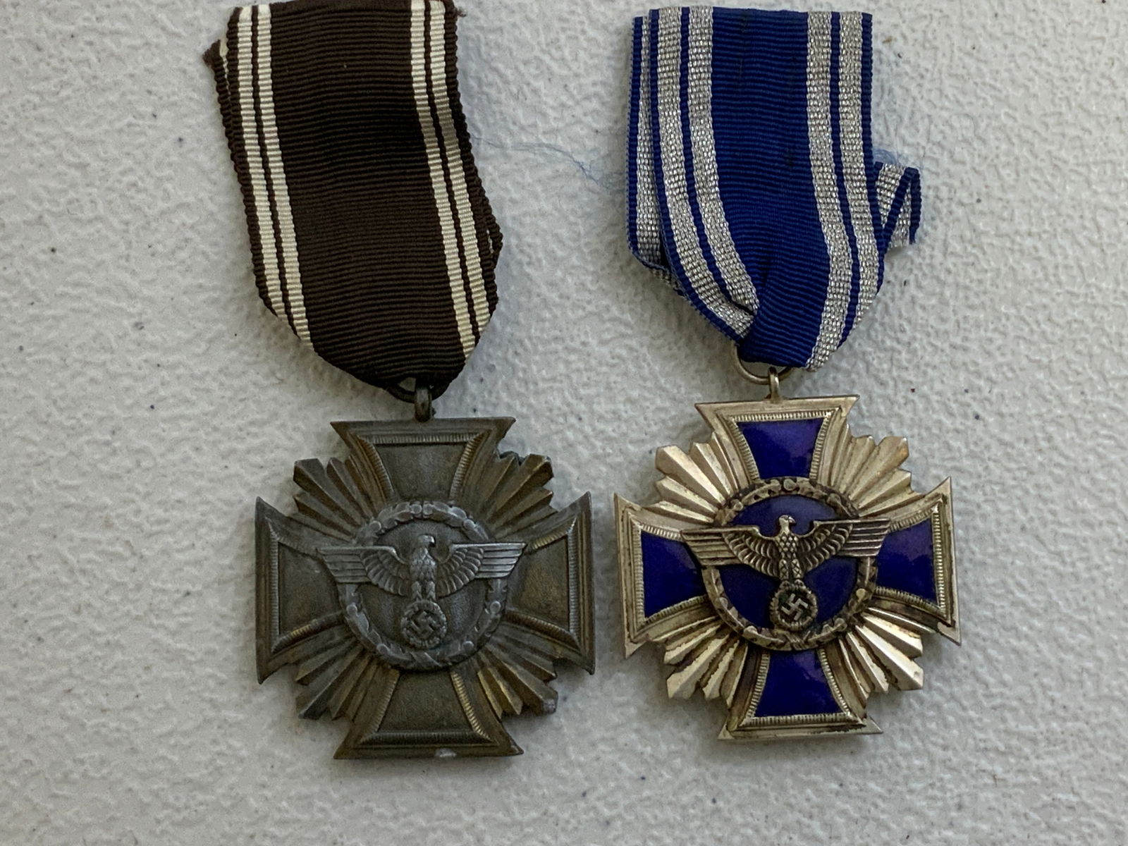 THIRD REICH GERMANY NSDAP LONG SERVICE MEDALS 10 AND 15 YEARS OF SERVICE: THIRD REICH GERMANY NSDAP LONG SERVICE MEDALS 10 AND 15 YEARS OF SERVICE. LOT OF 2. BOTH COMPLETE WITH RIBBONS