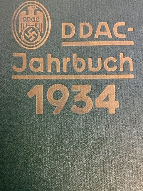 GERMANY THIRD REICH AUTOMOTIVE CLUB DDAC 1934 YEARBOOK: NAZI GERMANY DDAC GERMAN AUTOMOTIVE CLUB 1934 YEARBOOK . RARE EXAMPLE. NICE CONDITION BOOK FULL OF AUTOMOTIVE RELATED MATERIAL AND PICTURES AS WELL AS PERIOD ADVERTISING .