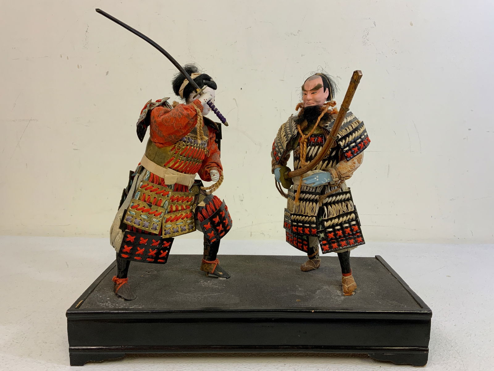 JAPAN TRADITIONAL VINTAGE JAPANESE SAMURAI WARRIORS DOLLS ON STAND: JAPAN TRADITIONAL VINTAGE JAPANESE SAMURAI WARRIORS DOLLS ON STAND. GREAT DETAILS.8" TALL DOLLS ON 12X6 STAND.