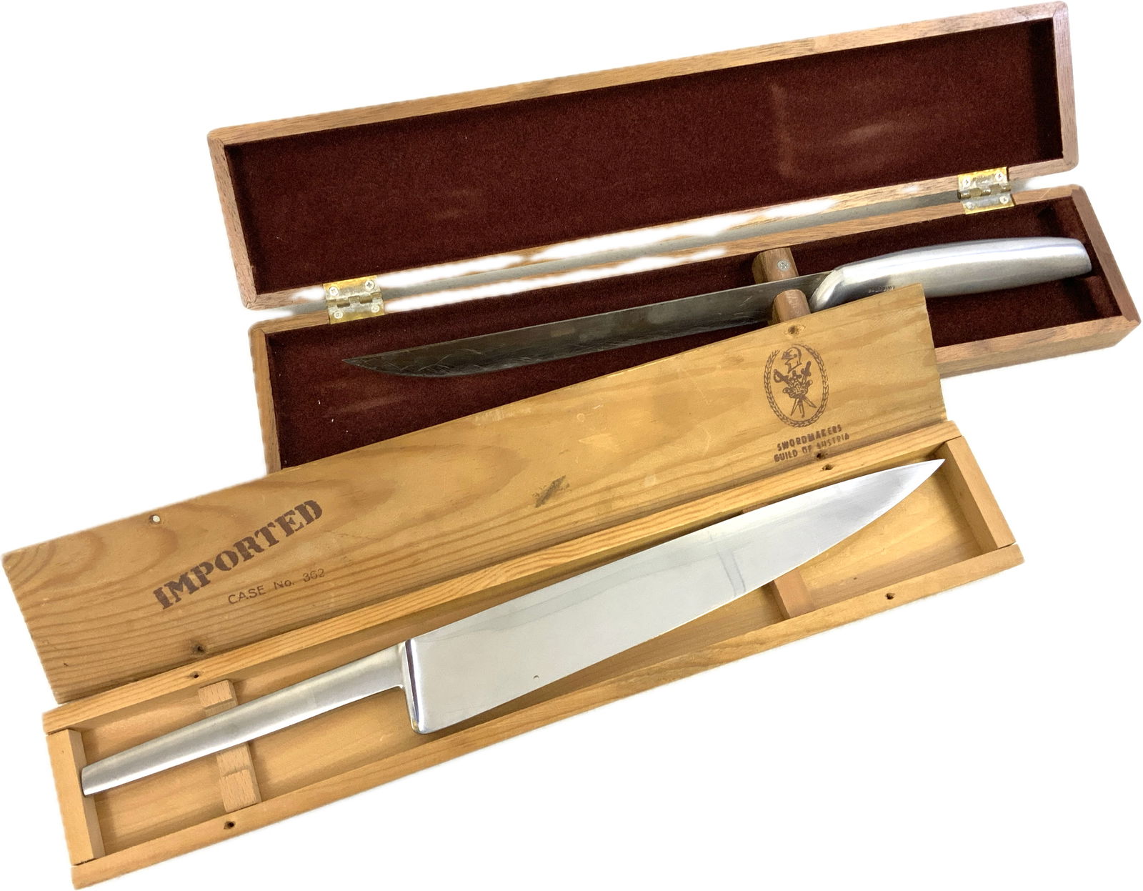 GERBER LEGENDARY BLADES AND SWORDMAKERS GUILD OF AUSTRIA CHEF'S KNIVES BOXED: Swordmakers Guild Of Austria No. 362 15" Delmonico Chef's Knife . Mint condition with original box. 14 1/2 overall length with 9 1/2" long blade. Gerber Legendary Blades tool steel Chef's Knife in Ori