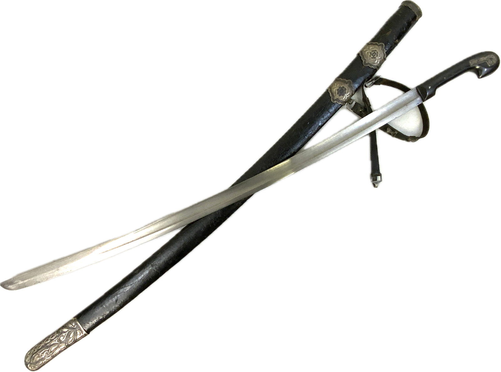 ANTIQUE RUSSIAN SHASHKA SWORD: ANTIQUE RUSSIAN SHASHKA SWORD.VERY NICE EXAMPLE . NICE STRONG BLADE. SILVER DECORATED FITTINGS.LEATHER COVERED SCABBARD WITH LEATHER AND SILVER DECORATED FITTINGS STRAPS.SIZE 38" LONG WITH 30 1/2" LON