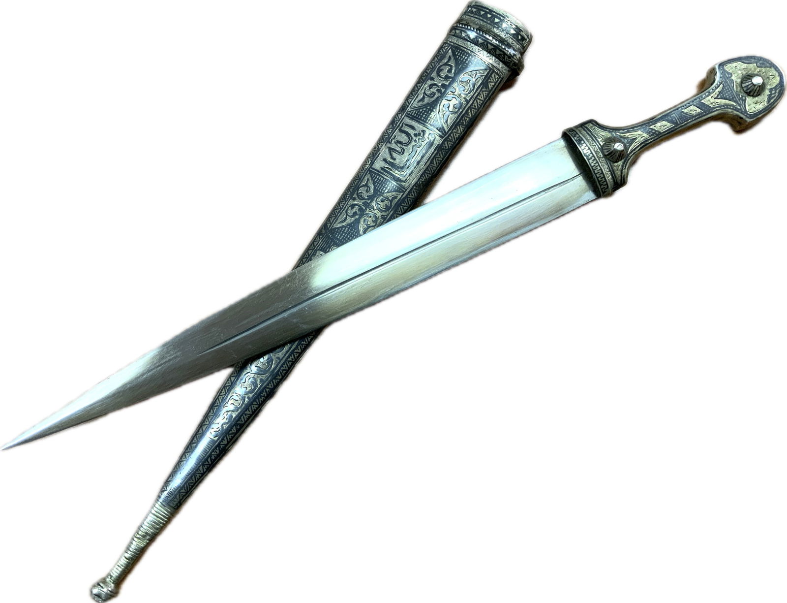 ANTIQUE RUSSIAN SILVER KINJAL DAGGER NIELLO DECORATED: ANTIQUE RUSSIAN SILVER KINJAL DAGGER NIELLO DECORATED. VERY NICE BEAUTIFUL SILVER WORK.BEAUTIFUL BROGHT BLADE. 15" LONG WITH 10" LONG BLADE.