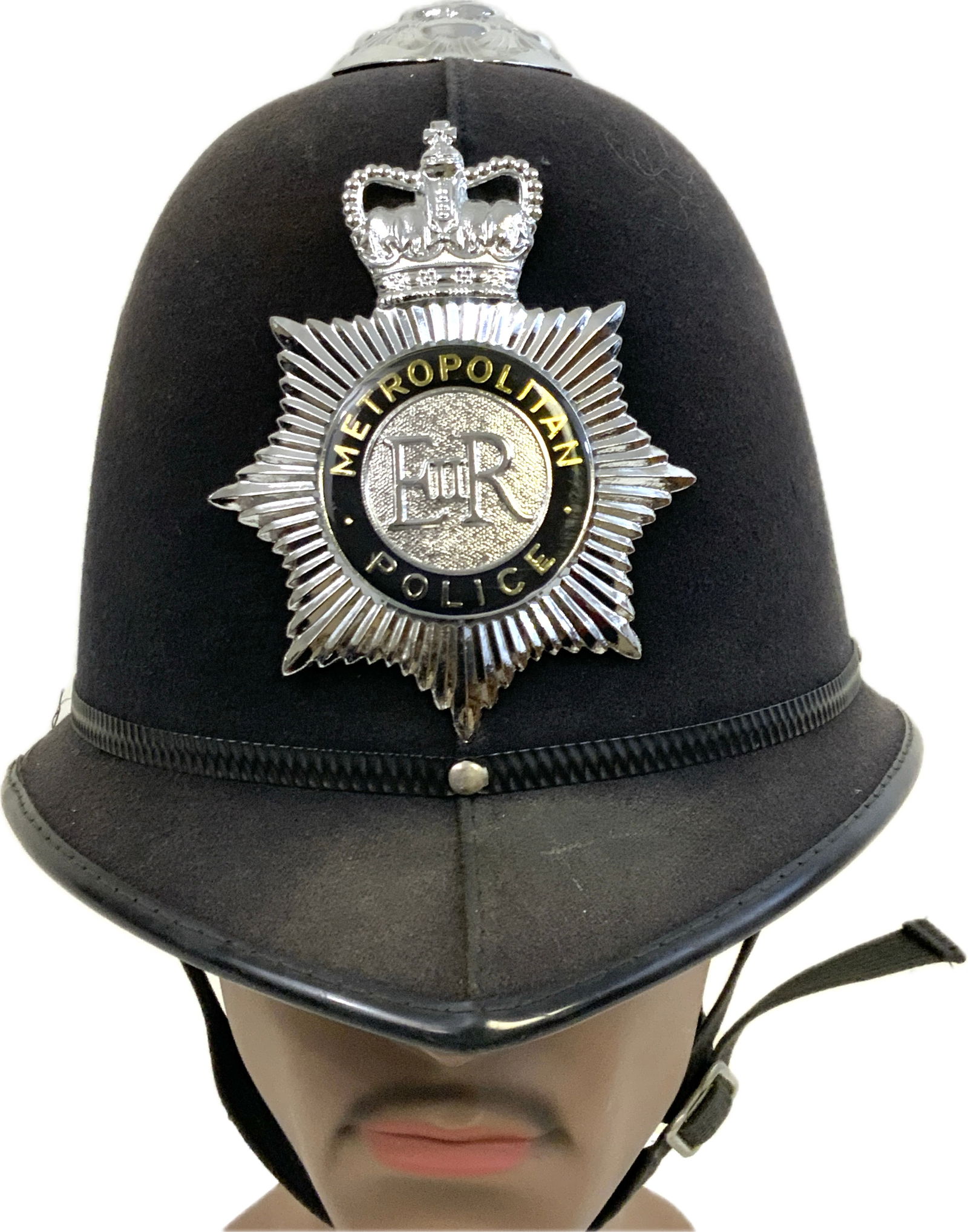 VINTAGE BRITISH LONDON METROPOLITAN POLICE BOBBY HELMET: VINTAGE BRITISH LONDON METROPOLITAN POLICE BOBBY HELMET. GREAT OVERALL CONDITION. CIRCA 1980'S.