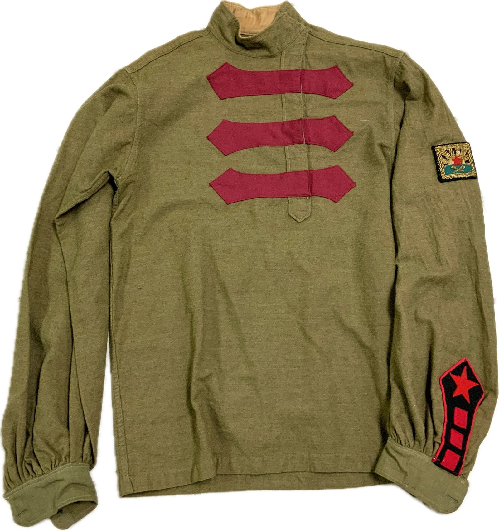 RUSSIAN CIVIL WAR RED ARMY CAVALRY OFFICERS UNIFORM SHIRT: RUSSIAN CIVIL WAR RED ARMY CAVALRY OFFICERS UNIFORM SHIRT. WOOL SHIRT WITH EARLY RED ARMY INSIGNIAS.. WELL WORN WITH A SMALL TEAR AROUND A SHOULDER AREA BUT STILL IN G00D OVERALL CONDITION. HAND EMBRO