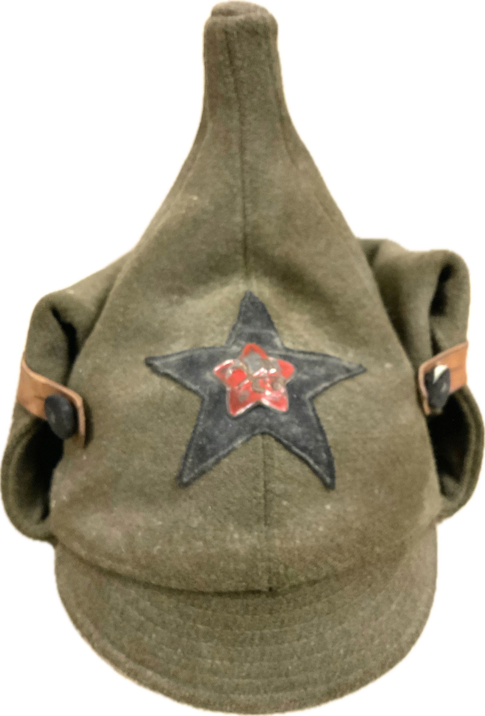 RUSSIAN CIVIL WAR RED ARMY BUDENOVKA CLOTH HELMET WITH EARLY RED STAR: RUSSIAN CIVIL WAR RED ARMY BUDENOVKA CLOTH HELMET WITH EARLY RED STAR.WELL WORN BUT STILL IN GOOD CONDITION. VERY RARE TO FIND. TALL CLOTH POINT. HEAVY WOOL MATERIAL.