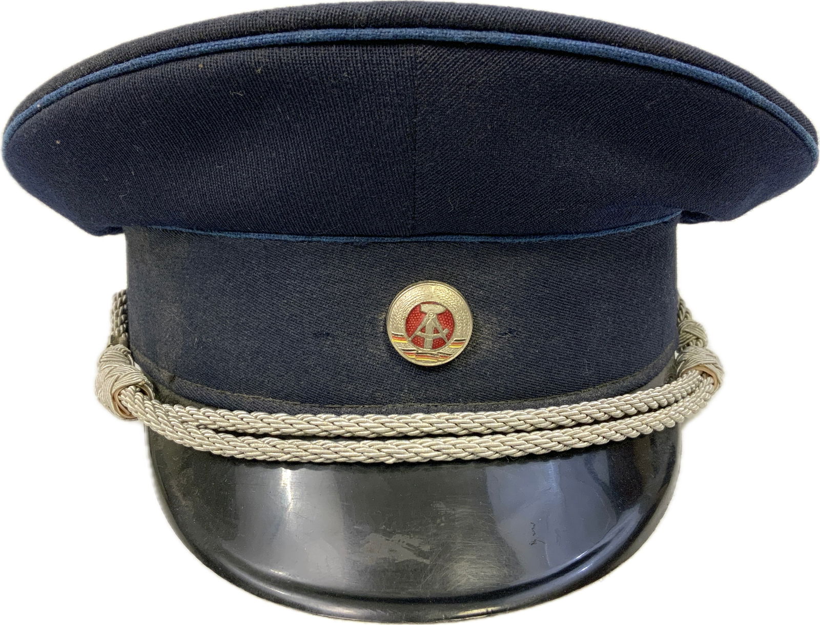 EAST GERMANY DDR POLICE OFFICERS VISOR HAT: EAST GERMANY DDR POLICE OFFICERS VISOR HAT.GOOD WORN CONDITION. SIZE 57.