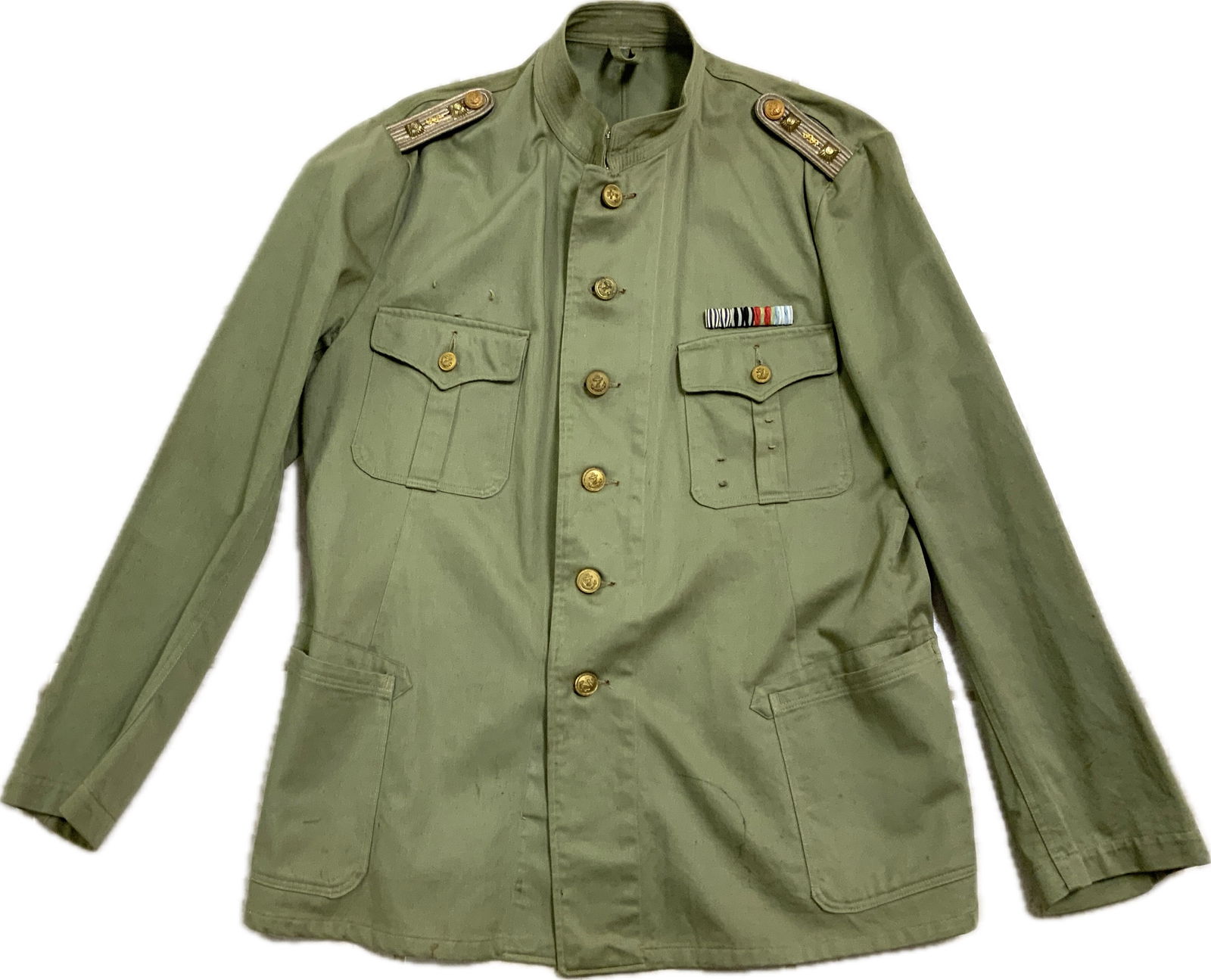 WWII GERMAN NAVY KRIEGSMARINE U-BOAT DOCTOR CANVAS UNIFORM TUNIC: WWII GERMAN NAVY KRIEGSMARINE U-BOAT DOCTOR CANVAS UNIFORM TUNIC.GREAT OVERALL CONDITION TUNIC WITH STAND UP COLLAR. LOOPS FOR THE BREAST EAGLE AND AWARDS. NICE MEDICAN NAVY SHOULDER STRAPS. BACK HAS