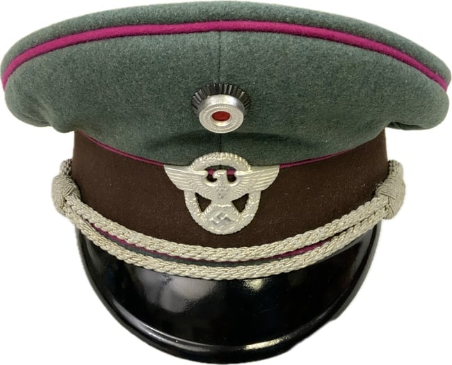 WWII GERMAN FIRE PROTECTION POLICE OFFICERS VISOR CAP: WWII GERMAN FIRE PROTECTION POLICE OFFICERS VISOR CAP. VERY RARE CAP TO FIND. GREEN WOOL BODY WITH CARMINE RED WAFFENFARBE PIPING FOR FIRE POLICE PROTECTION.GREAT CONDITION OVERALL. SIZE ABOUT 58.