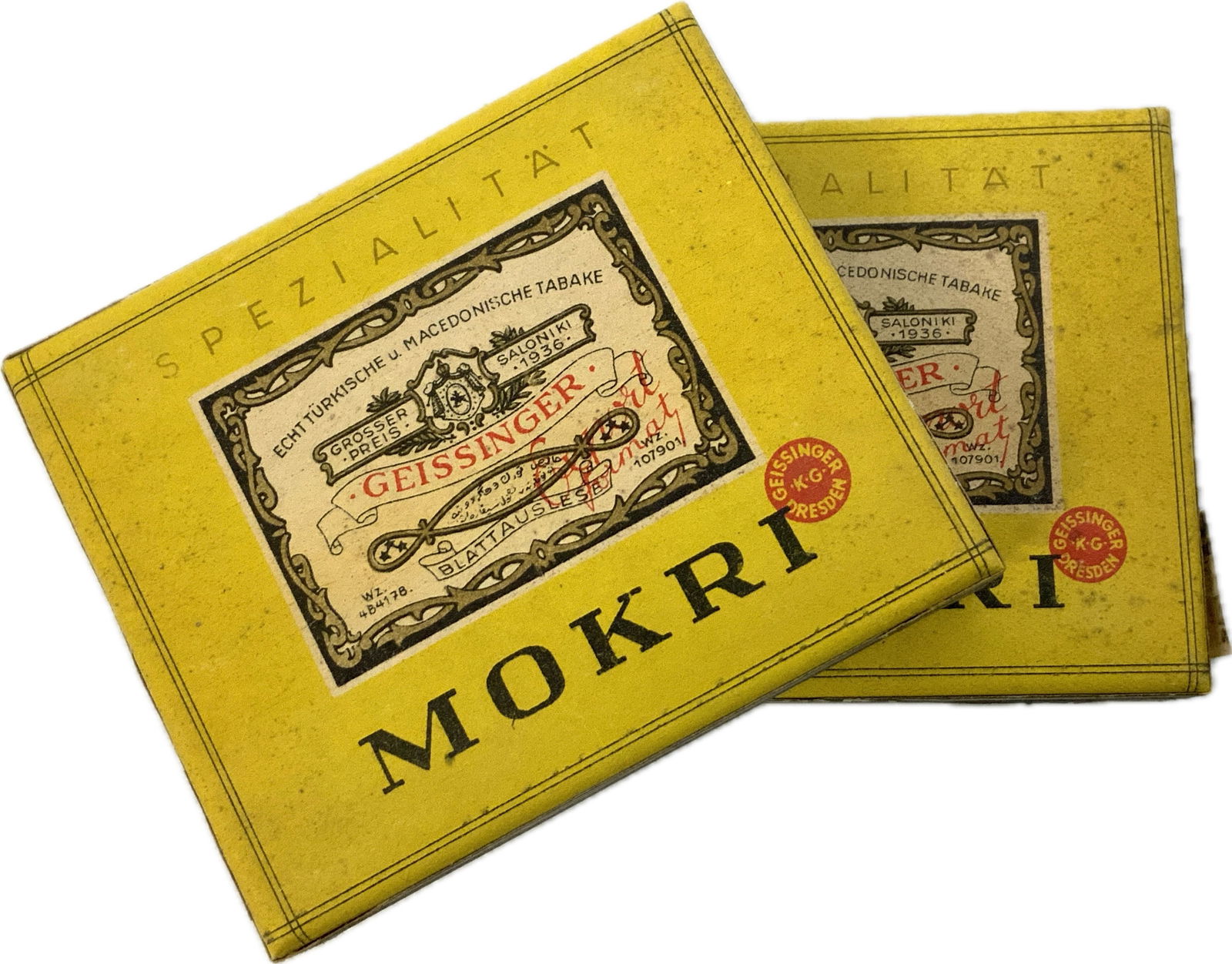WWII GERMAN WARTIME PACKS CIGARETTES GEISSINGER MOKRI: WWII GERMAN WARTIME PACKS CIGARETTES GEISSINGER MOKRI.ONE IS UNOPENED AND SEALED. ANOTHER IS OPEN BUT FULL. 2 PACKS. EAGLE TAX STAMP. GREAT CONDITION.