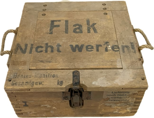 WWII GERMAN LUFTWAFFE ANTI-AIRCRAFT FLACK AMMUNITION CRATE: WWII GERMAN LUFTWAFFE ANTI-AIRCRAFT FLACK AMMUNITION CRATE. VERY GOOD CONDITION WOODEN CRATE. MARKED AND COMPLETE WITH ROPE HANDLES. 14 X 14 X 7 SIZE.