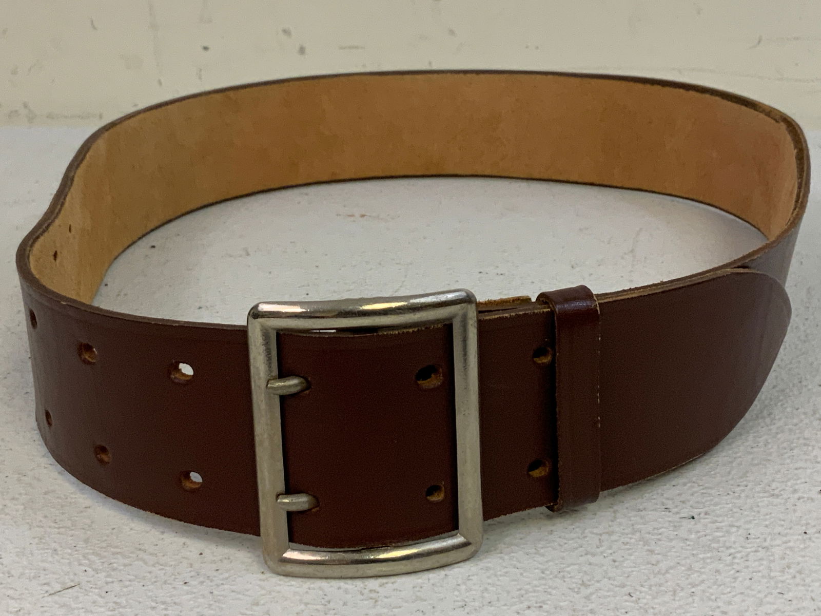 VINTAGE BROWN LEATHER GERMAN OFFICERS BELT WITH BUCKLE: VINTAGE BROWN LEATHER GERMAN OFFICERS BELT WITH BUCKLE. GREAT, MINT CONDITION.