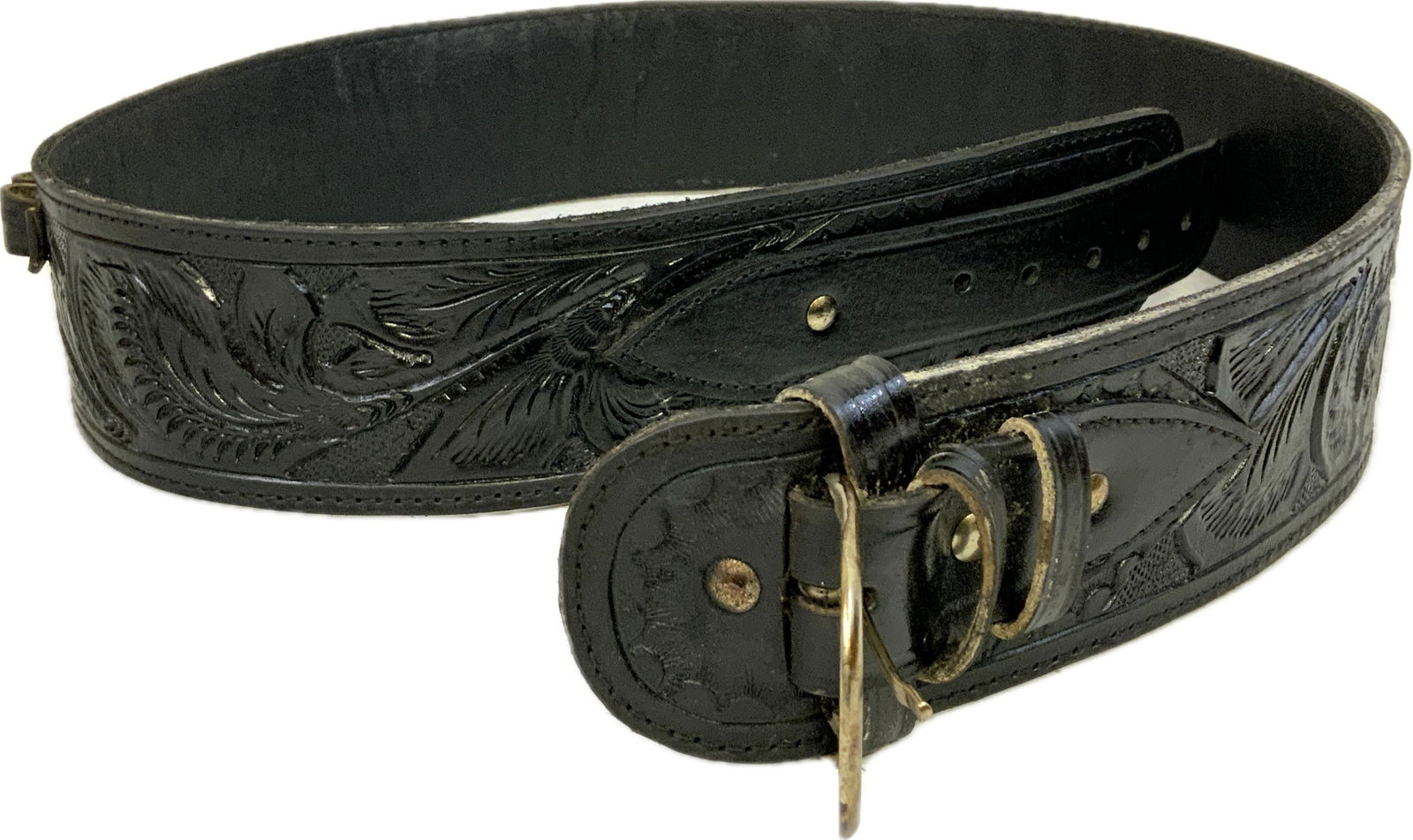 US WESTERN STYLE BLACK LEATHER .45 CALIBER CARTRIDGE BELT: US WESTERN STYLE BLACK LEATHER .45 CALIBER CARTRIDGE BELT. VERY NICE CONDITION THICK HEAVY DUTY LEATHER BELT WITH LOOPS FOR .45 CAL. CARTRIDGES. 3"WIDE AND 53" TOTAL LENGHT.