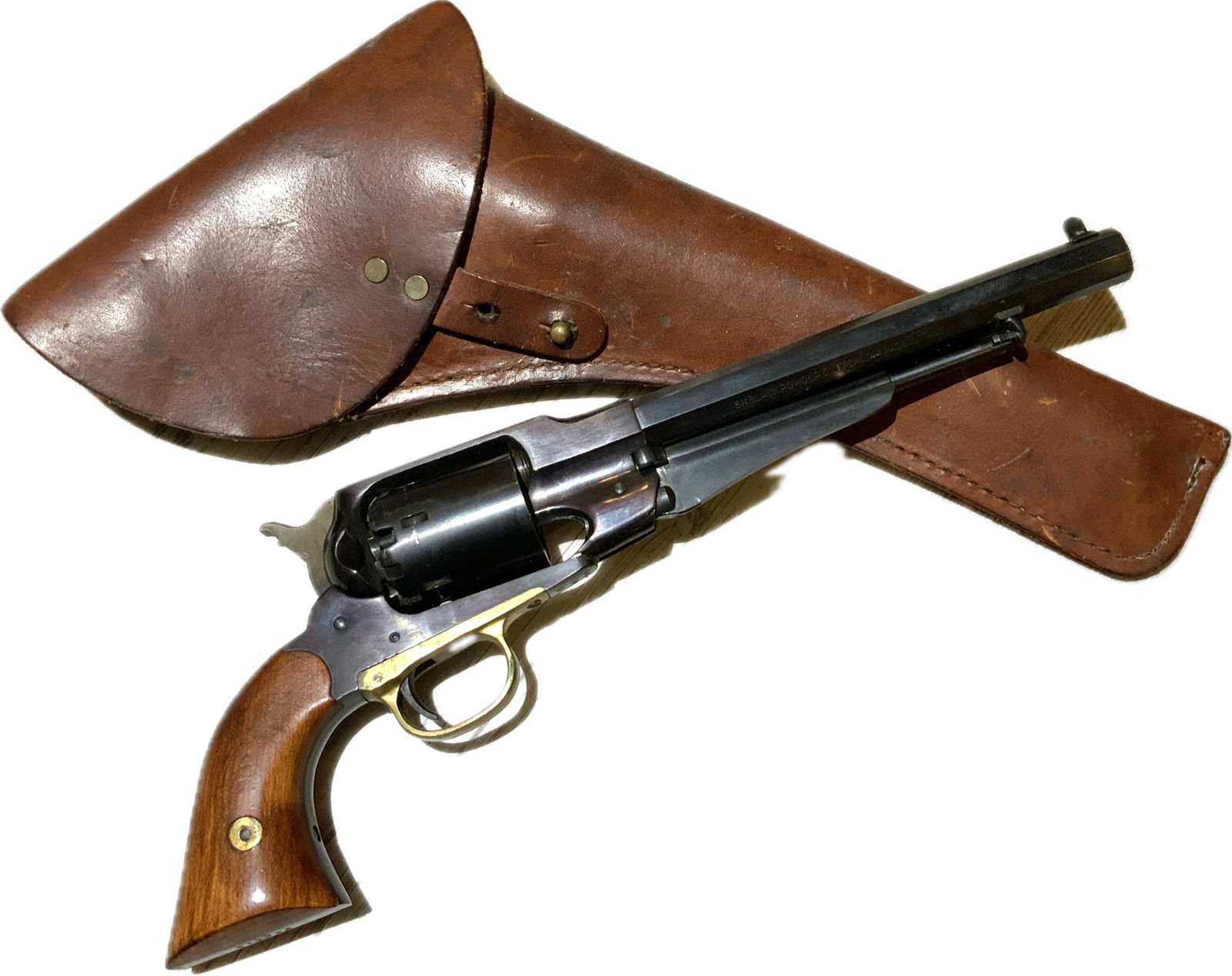 REMINGTON 1858 PERCUSSION REVOLVER: Italian Reproduction Remington Model 1858 Percussion Revolver made in Italy. Comes with Brown Leather Holster. Serial no. E17793, .44 caliber, 7 1/2-inch octagonal barrel with Italian maker markings.