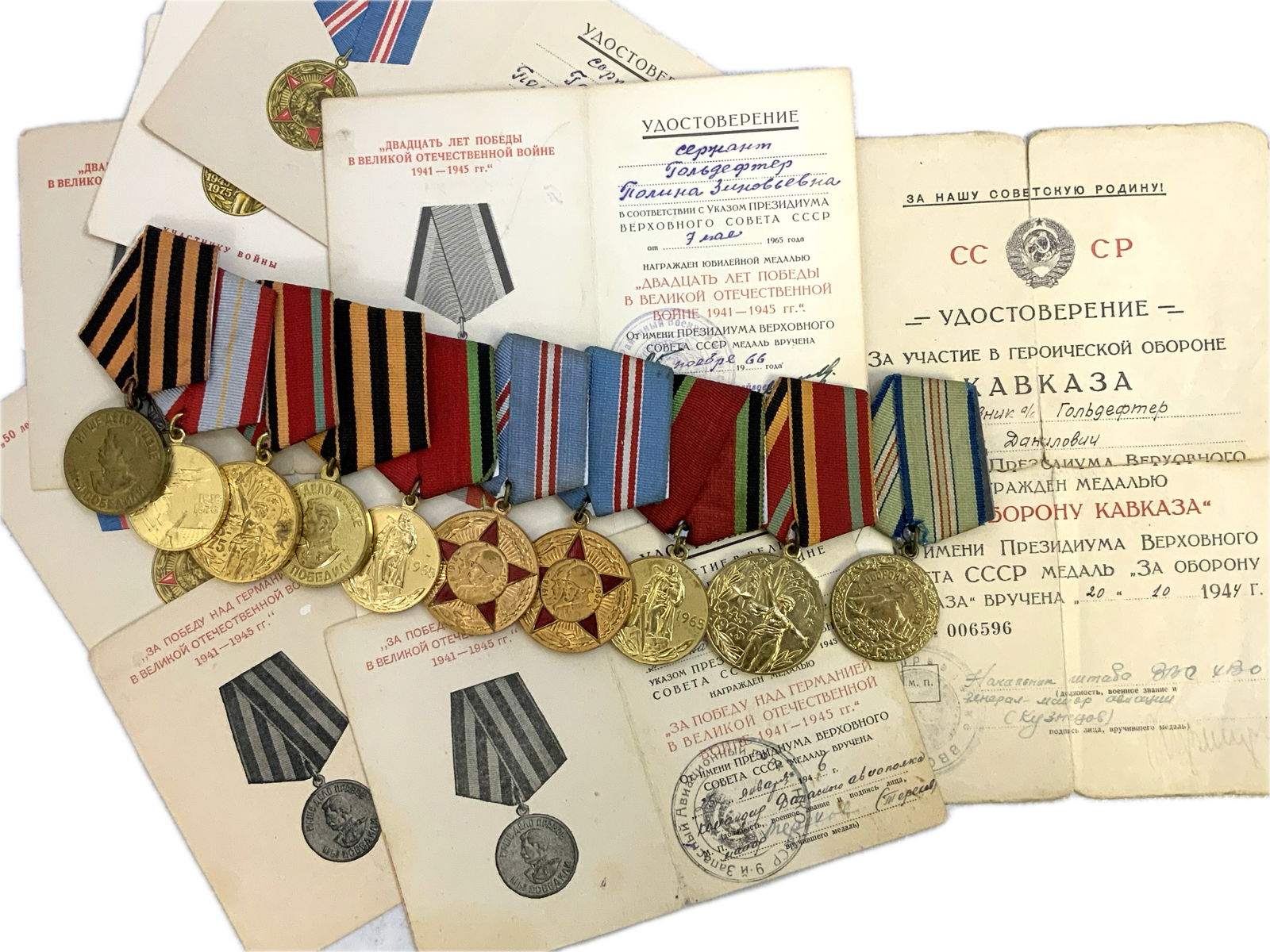 USSR WWII VETERANS FAMILY DOCUMENTED PERSONAL GROUP OF WWII AWARDS AND DOCUMENTS: USSR WWII VETERANS FAMILY DOCUMENTED PERSONAL GROUP OF WWII AWARDS AND DOCUMENTS. RARE TO FIND AWARDS TO HUSBAND AND WIFE. COMPLETE WITH ALL DOCUMENTS.