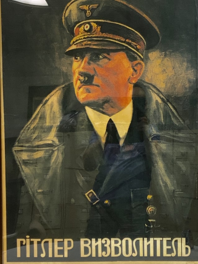 GERMANY THIRD REICH OCCUPIED UKRAINE HITLER LIBERATOR PROPAGANDA ARTWORK POSTER FRAMED: NAZI GERMANY OCCUPIED UKRAINE HITLER LIBERATOR ARTWORK POSTER . POSTER WAS PRODUCED BY THE PROPAGANDA OFFICES OF THE GERMAN GOVERNMENT DURING THE OCCUPATION OF USSR . POSTER IS IN GREAT CONDITION FRAM