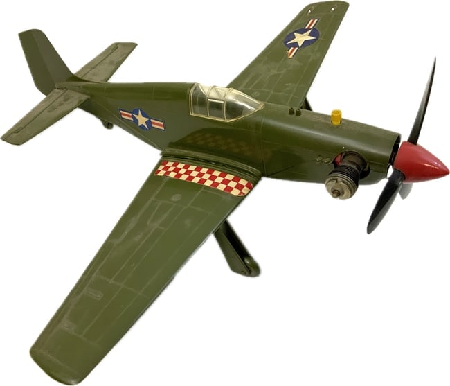 COX AVION P-51 MUSTANG CONTROL LINE GAS ENGINE PLASTIC AIRPLANE: COX AVION P-51 MUSTANG CONTROL LINE GAS ENGINE PLASTIC AIRPLANE. CIRCA 1960'S. WELL USED. WORKING CONDITION IS UNKNOWN. 14" LONG WITH 16" WINGSPAN