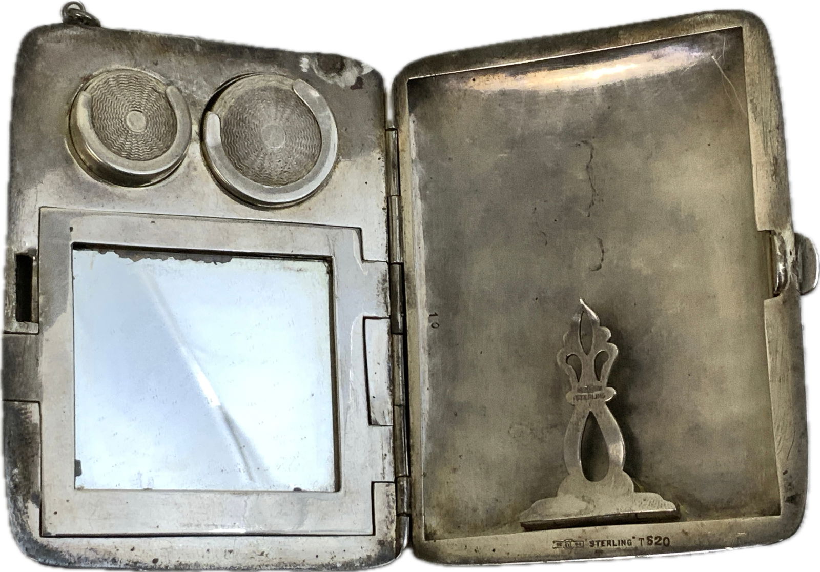 ANTIQUE STERLING SILVER LADIES CIGARETTE CASE WITH MIRROR AND COIN HOLDER: ANTIQUE STERLING SILVER LADIES CIGARETTE CASE WITH MIRROR AND COIN HOLDER. HIGH QUALITY CASE WITH ERS. INNITIALS ENGRAVED. MARKED STERLING INSIDE. 2 1/2 X 3 1/2 SIZE.
