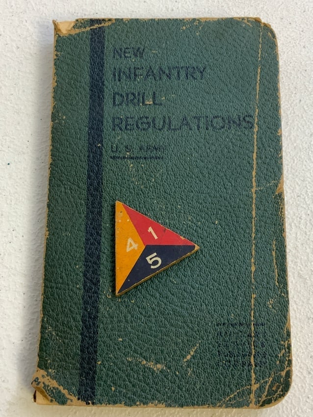 WWII US ARMY NEW INFANTRY DRILL REGULATIONS 1941 BOOK: WWII US ARMY NEW INFANTRY DRILL REGULATIONS 1941 BOOK. NAMED INSIDE. COMES WITH SMALL WOOD INSIGNIA PIECE.