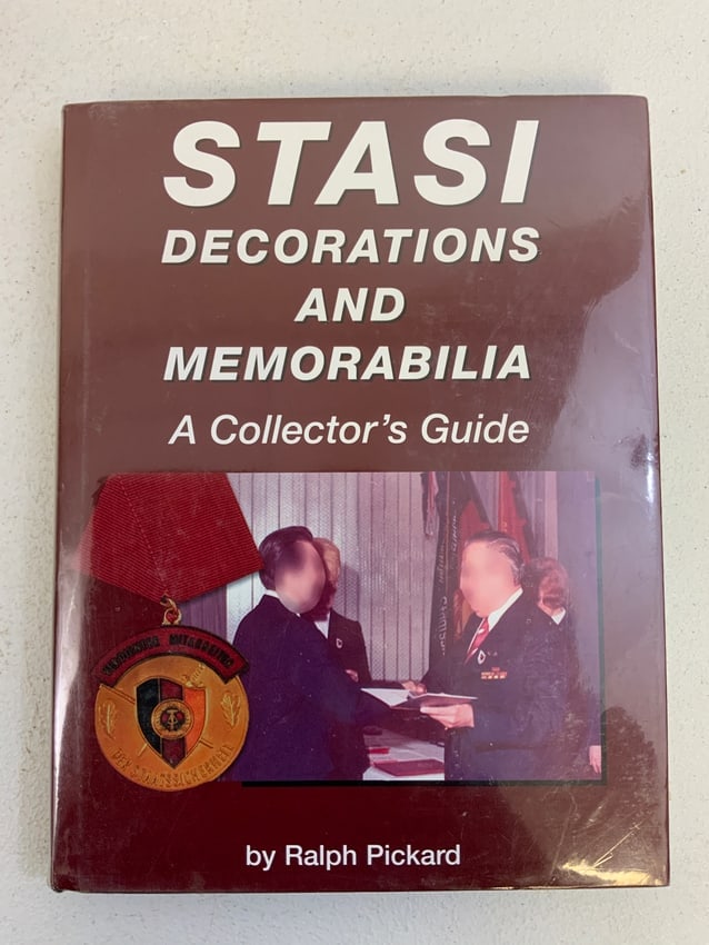 EAST GERMAN STASI DECORATIONS AND MEMORABILIA BOOK: EAST GERMAN STASI DECORATIONS AND MEMORABILIA BOOK. BRAND NEW SEALED IN PLASTIC WRAP.