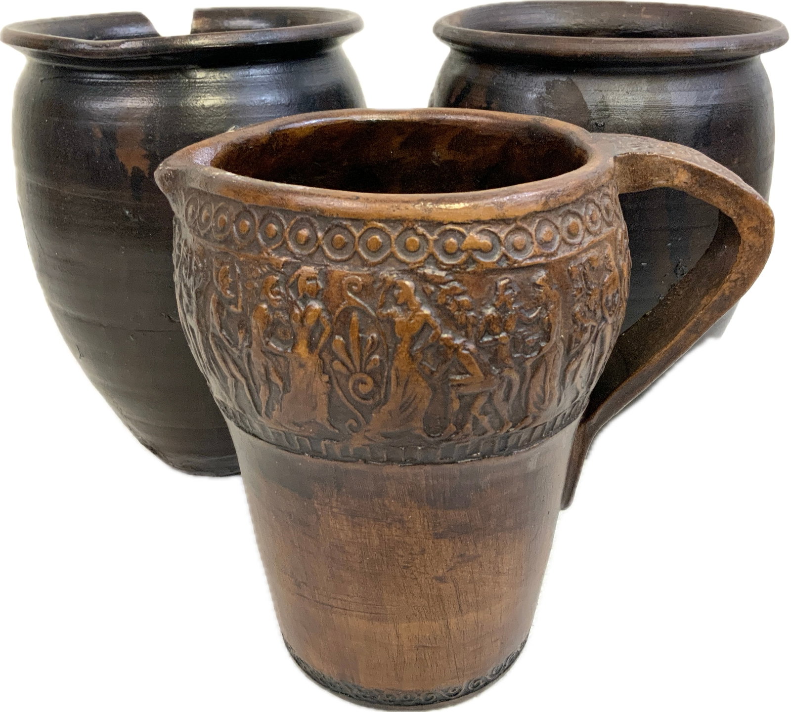 ANTIQUE GREEK CLAY PITCHER WITH DIONYSIAN DECORATIONS AND ANTIQUE OLIVE STORAGE JARS: ANTIQUE GREEK CLAY PITCHER WITH DIONYSIAN DECORATIONS AND ANTIQUE OLIVE STORAGE JARS.JARS.SALAH ED-DIN, OLD JERUSALEM. 6 1/2" TALL, 4 1/2" DIAM. JARS AND 6" TALL, 4" DIAM. PITCHER. EX. TURIN