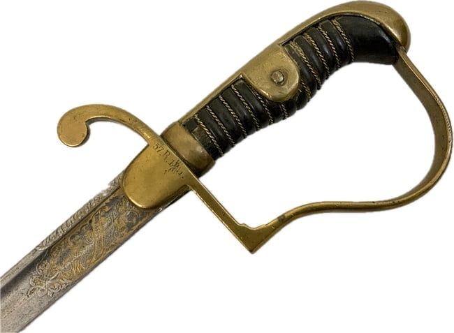 IMPERIAL GERMANY FINE DAMASCUS BLADE ARMY OFFICERS SWORD: IMPERIAL GERMANY FINE DAMASCUS BLADE OFFICERS SWORD. VERY NICE BLADE WITH ETCHED AND GOLD WASHED DETAILS AND MARKED "DAMASCSTAHL" AND "EISENHAUER". ETCHED SPINE OF THE BLADE NEAR RECASSO.COMPLETE