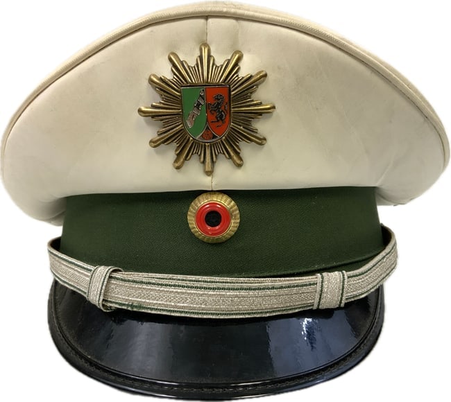 GERMANY GERMAN POLICE OFFICERS WHITE TOP VISOR HAT: GERMANY GERMAN POLICE OFFICERS WHITE TOP VISOR HAT. GOOD USED CONDITION.SIMULATED LEATHER LIKE MATERIAL TOP. SIZE 56.
