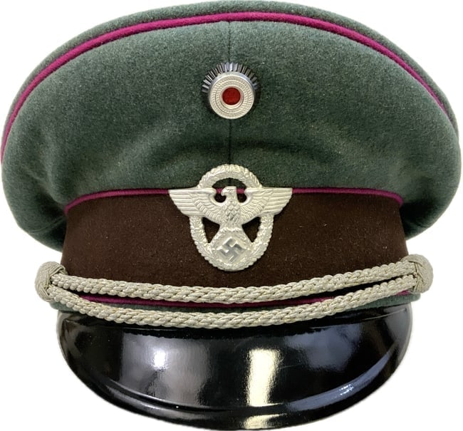WWII GERMAN FIRE PROTECTION POLICE OFFICERS VISOR CAP: WWII GERMAN FIRE PROTECTION POLICE OFFICERS VISOR CAP. VERY RARE CAP TO FIND. GREEN WOOL BODY WITH CARMINE RED WAFFENFARBE PIPING FOR FIRE POLICE PROTECTION.GREAT CONDITION OVERALL. SIZE ABOUT 58.