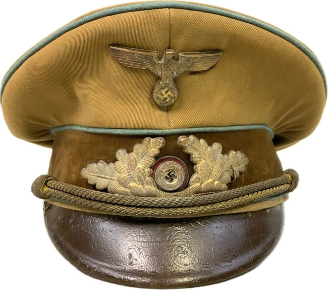 THIRD REICH GERMAN NSDAP POLITICAL LEADERS VISOR CAP HAT - NAMED: Third Reich NSDAP Ortsgruppe Local Group Level Political Leader's Visor Cap.Very nice example with normal wear for its age. RZM tag inside and named to E.SROMMEL.There are interesting stitches behind