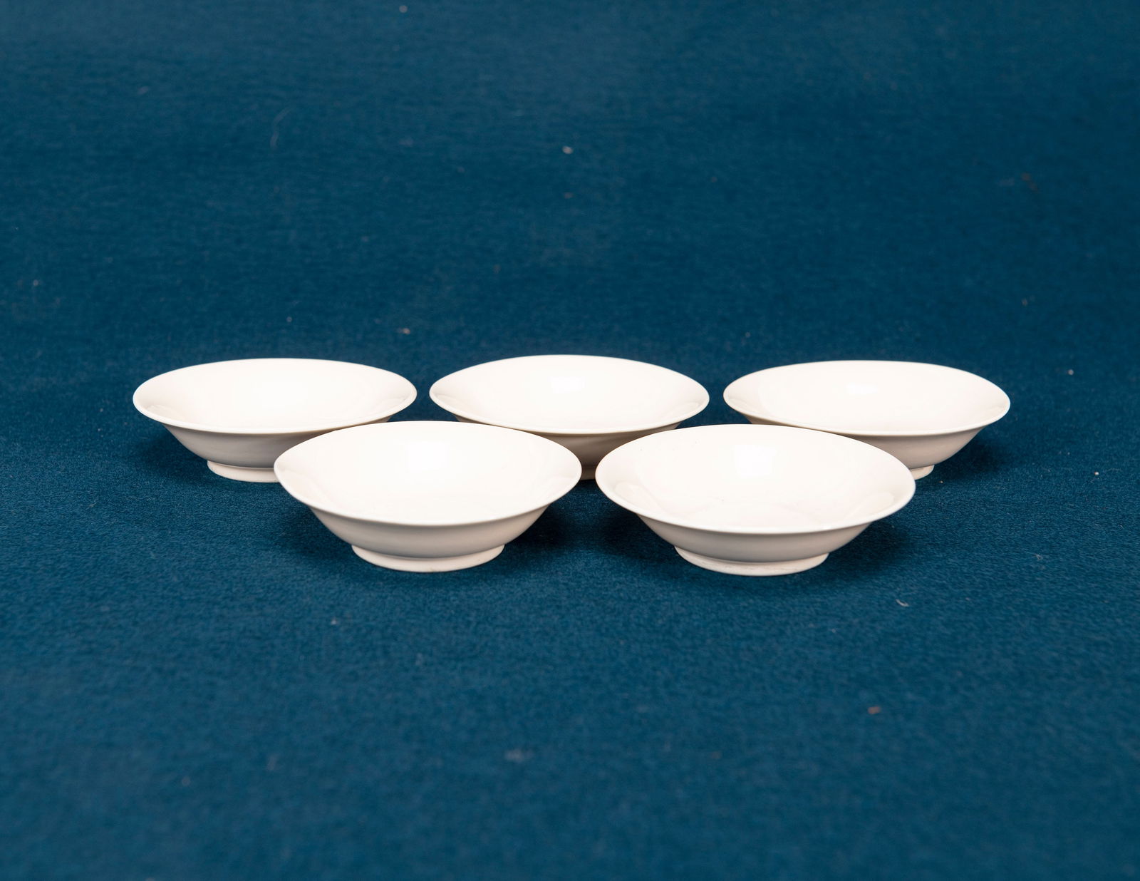 Five Chinese Dehua Ware Saucers (1 of 4)
