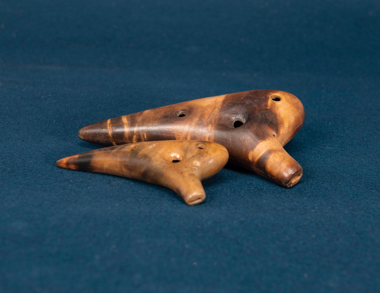 Two Chinese Pottery Ocarinas: W:12.1/17cm