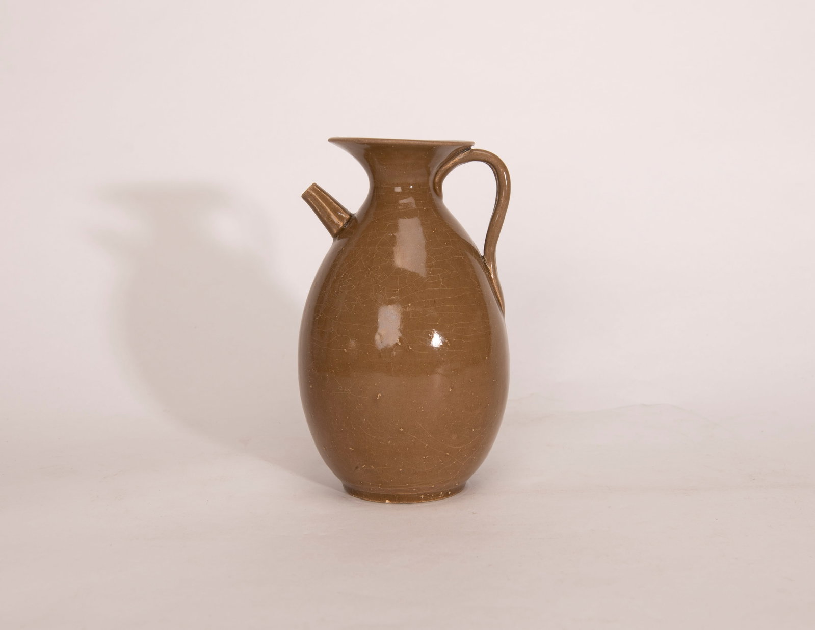 A Chinese Yue Ware Ewer: H:19.5cm