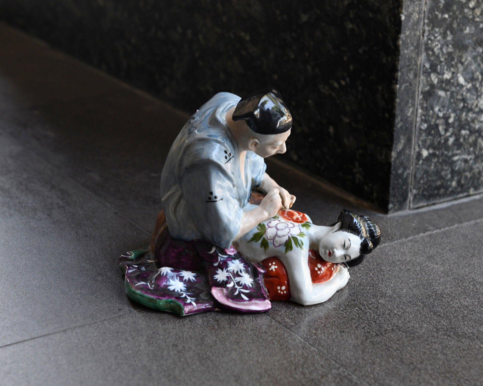 A Japanese Porcelain Shunga Figure: H:18.5cm