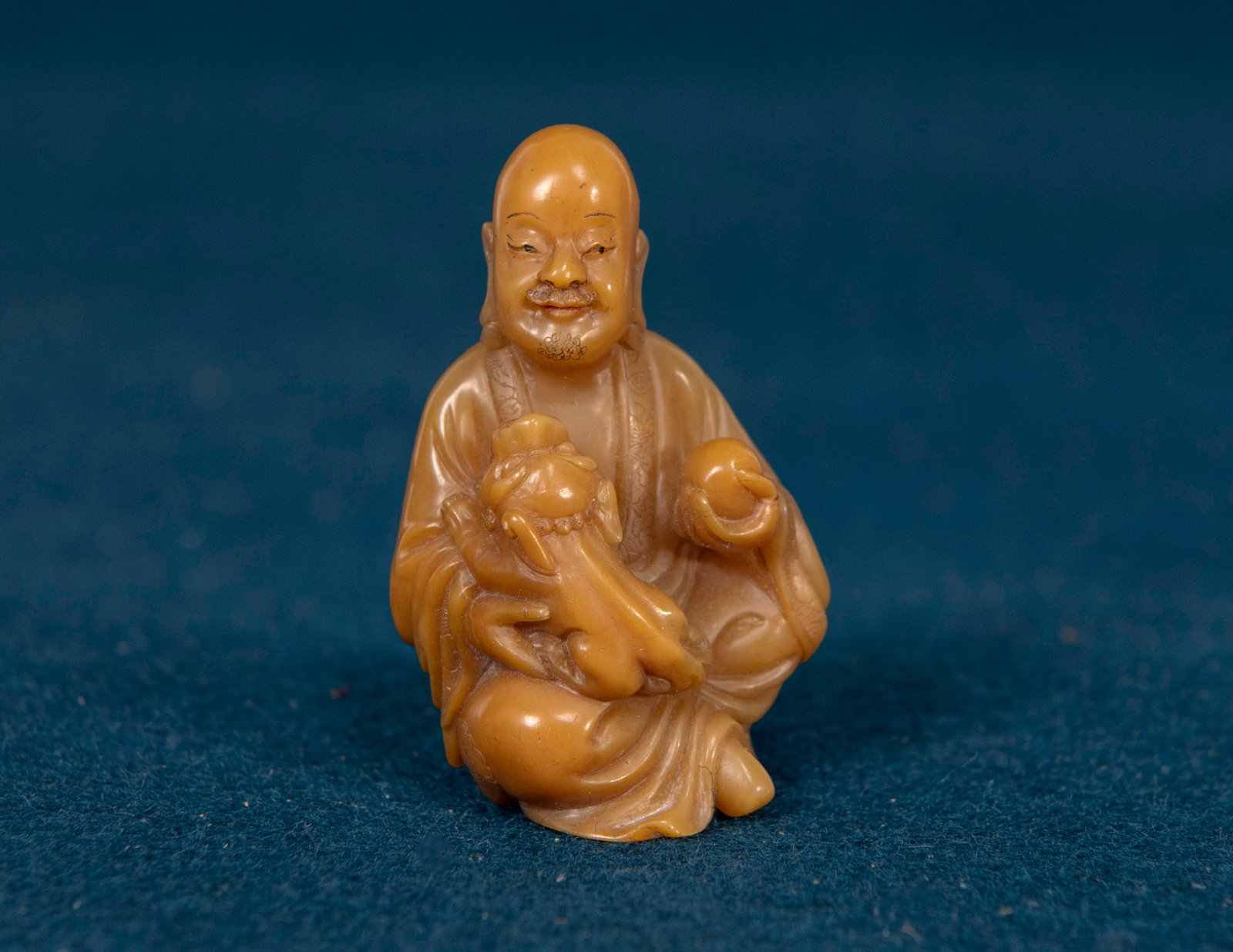 A Chinese Shoushan Stone Carved Luohan (1 of 5)