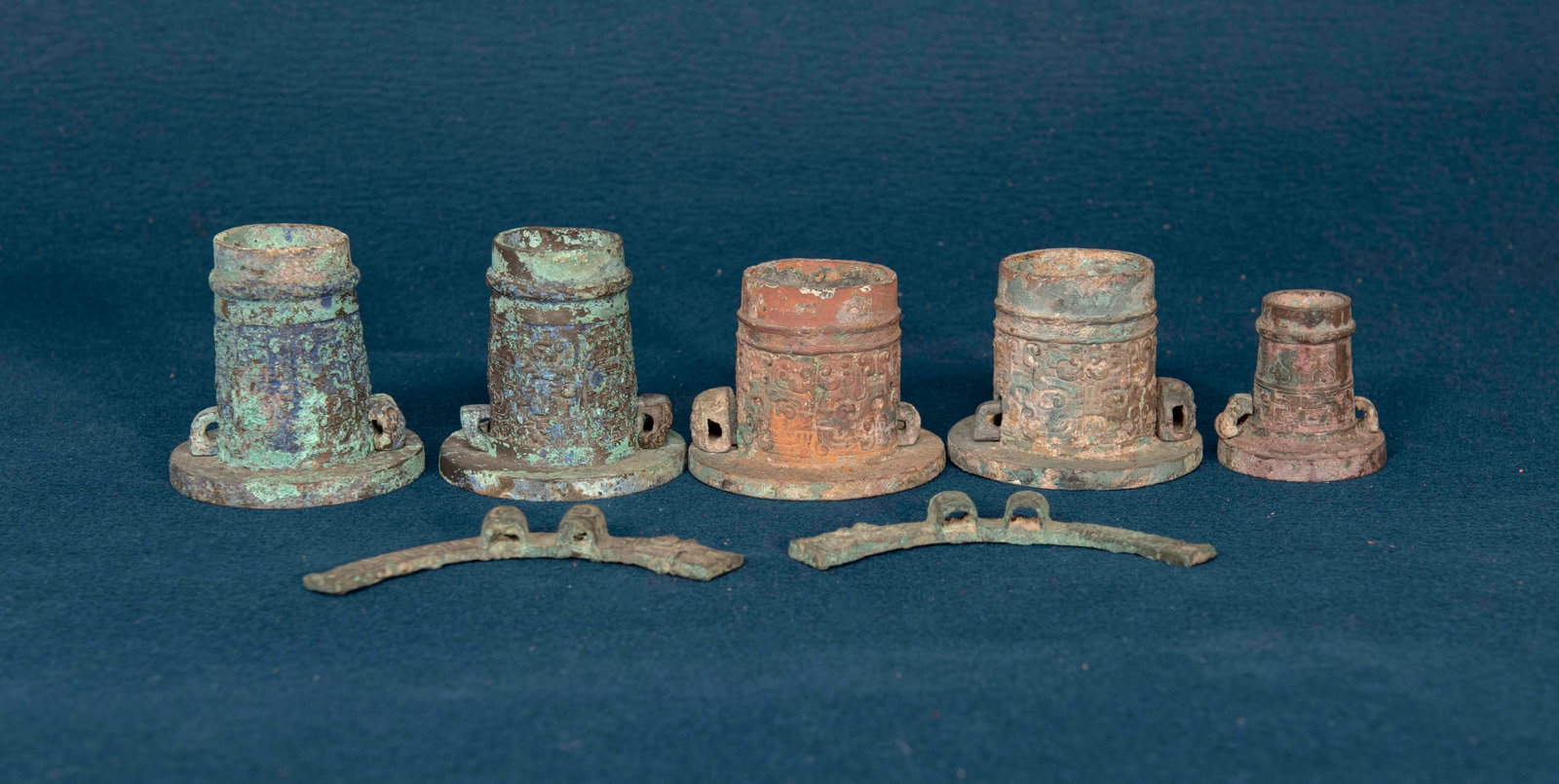 Seven Chinese Bronze Ornements: W:12.2cm, varying sizes