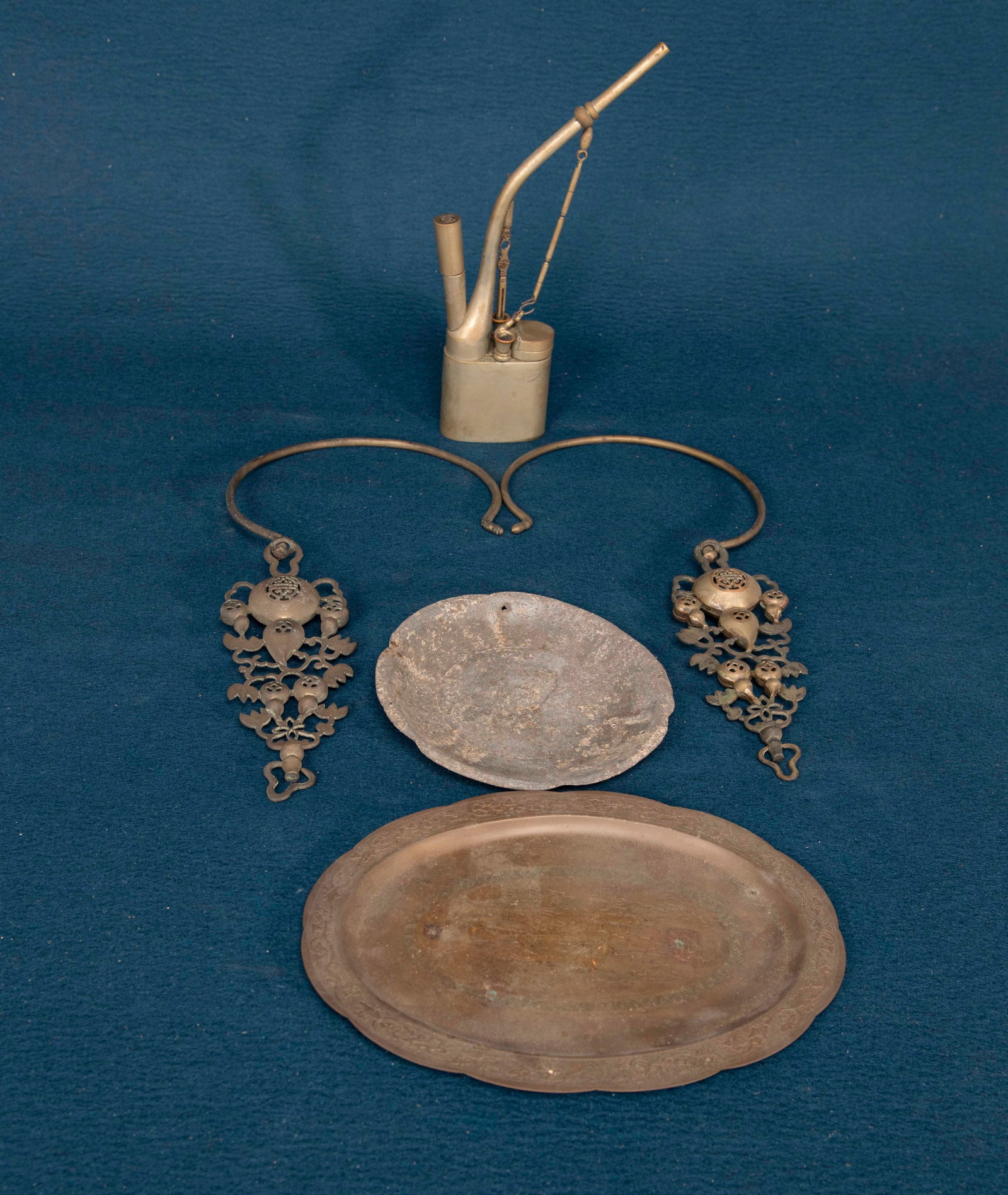 A Chinese Water Pipe and Two Bronze Dishes and Two Bronze Ornements: H:24.3cm , varying sizes