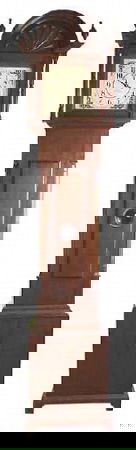 19c Seth Thomas Longcase Grandfather Clock : In a rich chocolate brown mahogany case, with shell, urn finial and column pediment bonnet, white tone dial, diamond shape hands, two train movement chimes on the half hour and on the hour, front door