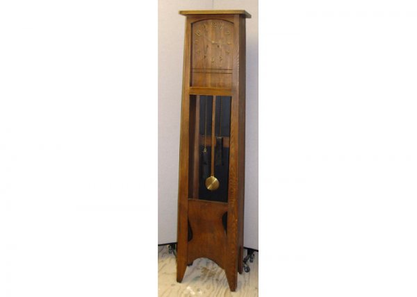 Mission Oak Style Arts Crafts Grandfather Clock : With a two key wind movement, charms on the hour, pendulum swings, faux weights and measures SIZE: 11"l x 17.25"w, length 75.5"h. CONDITION: Good, working order, keeps good time.