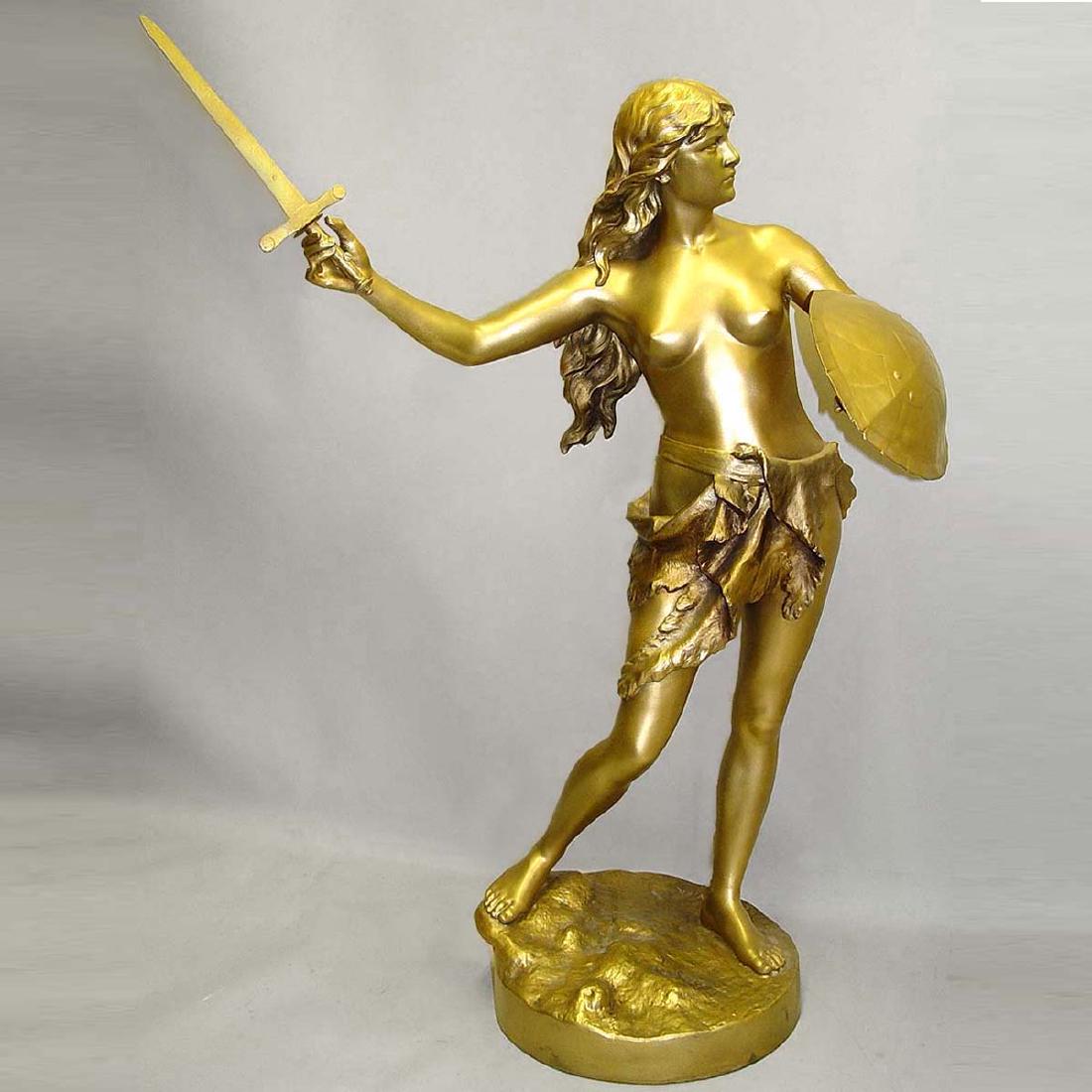 FRENCH NUDE FEMALE WARRIOR GARDEN SCULPTURE J. GARNIER;: FRENCH NUDE FEMALE WARRIOR GARDEN SCULPTURE J. GARNIER; signed J. Garnier on the base, depicting a lovely flowing hair semi nude female brandishing a tortoise shield and sword at the ready, with super