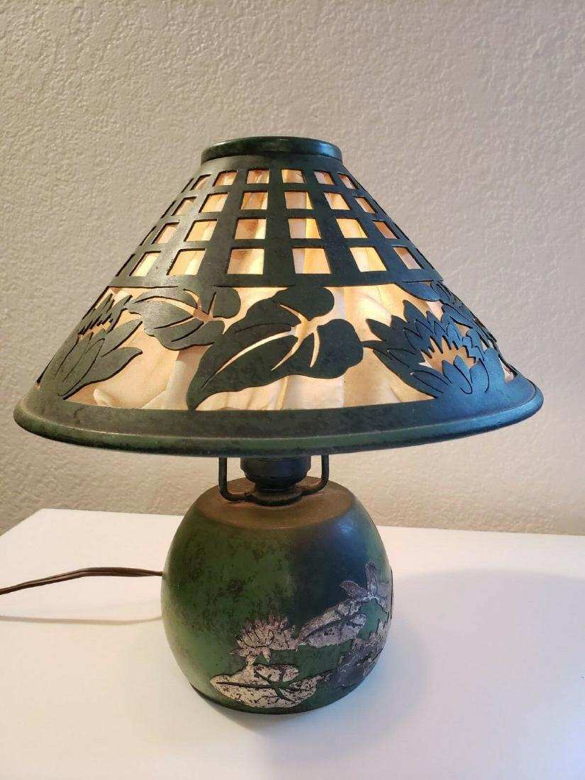 HEINTZ STERLING BRONZE BOUDOIR LAMP WATER LILY PATTERN: HEINTZ STERLING BRONZE BOUDOIR LAMP WATER LILY PATTERN Silk-lined cut-out shade; foil label, STERLING SILVER ON SOLID BRONZE. DETAILS: - SIZE: 9-1/2 In. Height / 9 In. Shade Diameter. - CONDITION: Exc