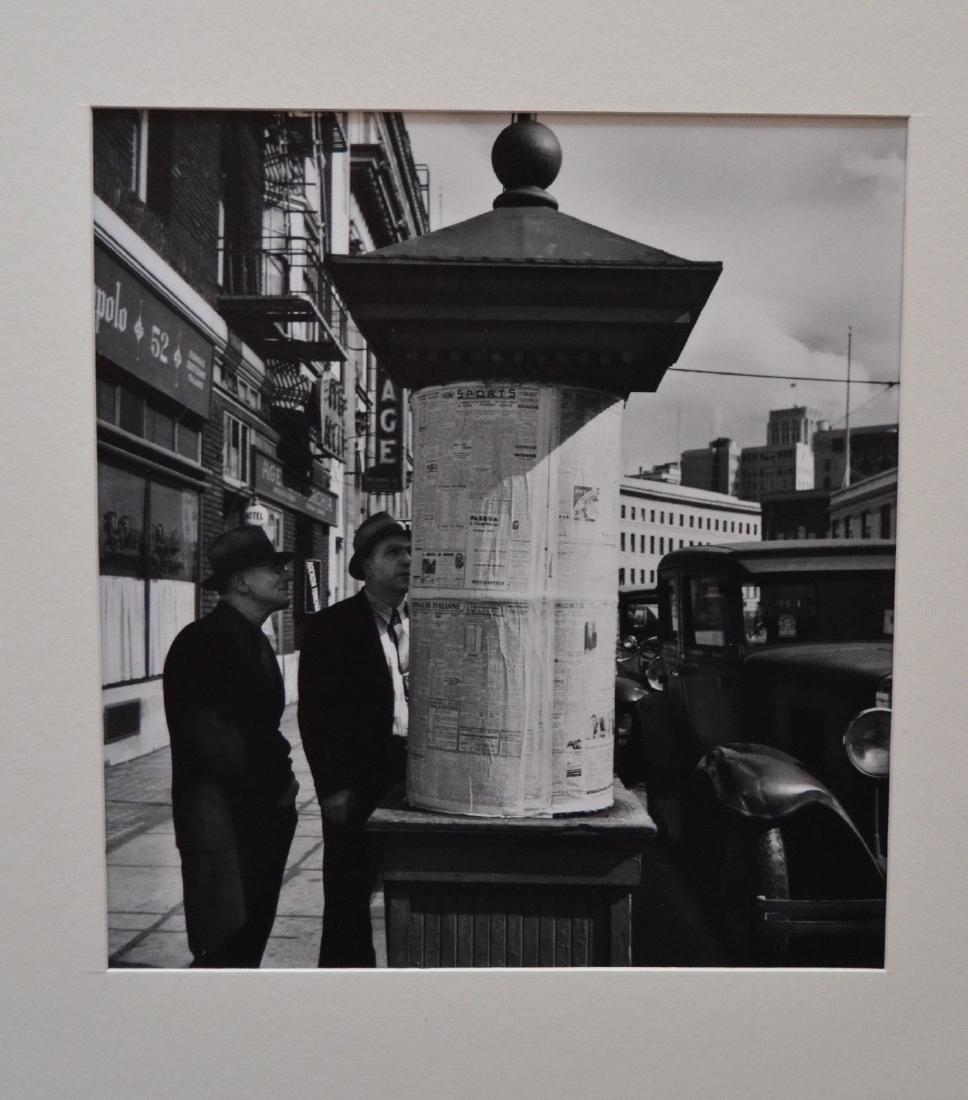 JOHN GUTMANN 1934 NEWSSTAND SAN FRANCISCO PHOTOGRAPH: JOHN GUTMANN 1934 NEWSSTAND SAN FRANCISCO PHOTOGRAPH JOHN GUTMANN (German, 1905-1998) News From Italy Posted At 'LA VOICE DEL POPULO' SAN FRANCISCO, 1934 Gelatin silver, printed later size: 7.5 x 8.25