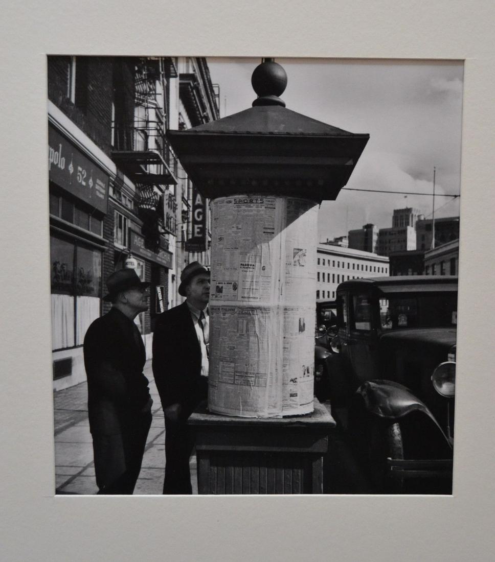 JOHN GUTMANN 1934 NEWSSTAND SAN FRANCISCO PHOTOGRAPH: JOHN GUTMANN 1934 NEWSSTAND SAN FRANCISCO PHOTOGRAPH JOHN GUTMANN (German, 1905-1998) News From Italy Posted At 'LA VOICE DEL POPULO' SAN FRANCISCO, 1934 Gelatin silver, printed later size: 7.5 x 8.25
