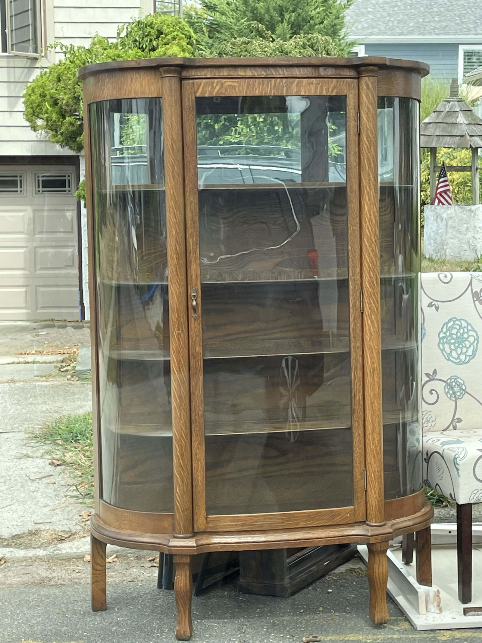 Rounded glass curio cabinet deals