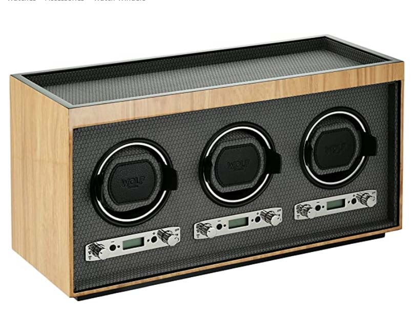 WOLF 453728 MERIDIAN TRIPLE WATCH WINDER, BLONDE Chrome plated control panel and accents Silver: WOLF 453728 MERIDIAN TRIPLE WATCH WINDER, BLONDE Chrome plated control panel and accents Silver textured silk faceplate Lock-In cuff accommodates a wrist size in excess of 10 inches Handcrafted solid 