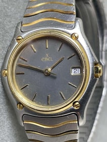 EBEL SPORTWAVE 18 KARAT BEZEL AND STEEL SWISS QUARTZ WATCH An Outstanding Ladys Ebel Sportwave