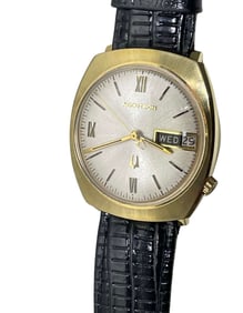 14K SOLD GOLD BULOVA ACCUTRON SILVER ROMAN STICK DAY DATE WATCH Circa 1975, with a Swiss electric