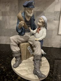 LLADRO 5207 'A TALL YARN' SCULPTURE FIGURINE OLD SAILOR & BOY Handmade and painted with a glossy