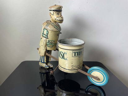 MARX TIDY TIM WALKER TIN LITHO WINDUP TOY SANITATION MAN    Made in USA by Marx. 1930's Tin Litho: MARX TIDY TIM WALKER TIN LITHO WINDUP TOY SANITATION MAN  Made in USA by Marx. 1930's Tin Litho Windup Sanitation Man as is without tools or box.  DETAILS: - SIZE:8-3/4 In. Length x 7-1/2 In. Height.