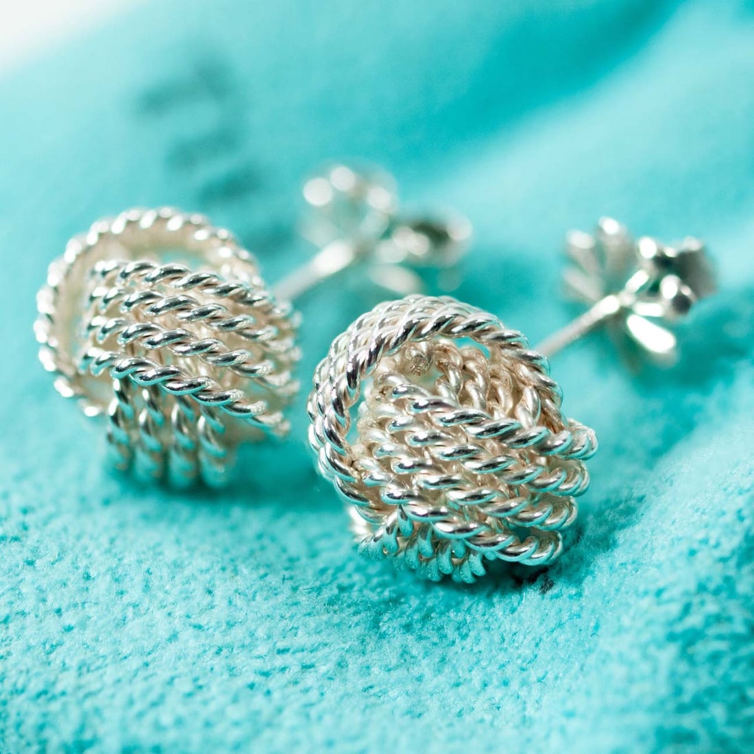 TIFFANY & CO. SILVER SOMERSET MESH LOVE KNOT STUD EARRINGS     Outstanding pre-owned Tiffany & Co. (1 of 7)